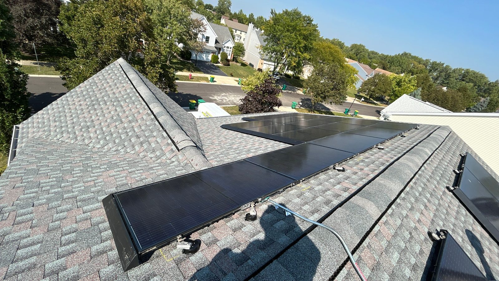 Removal and reinstall in Schaumburg, IL — solar panels reinstalled on a completed roof