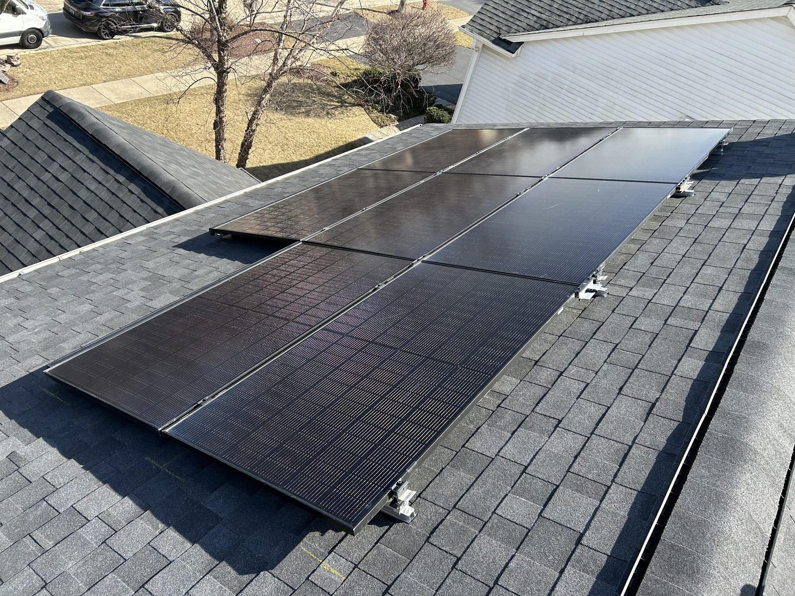 Removal and reinstall in Hoffman Estates, IL — solar panels reinstalled on a completed roof