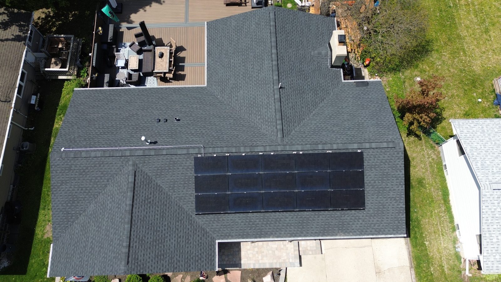 Removal and reinstall in Aurora, IL — solar panels reinstalled on a completed roof
